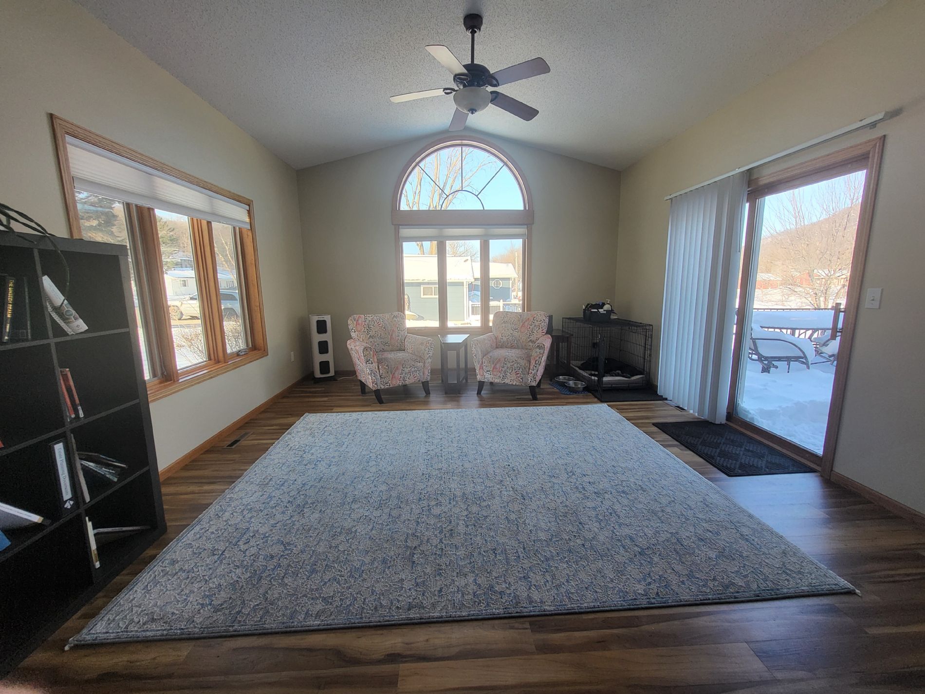 Sitting/study/alternate dining room with 270 degree views, access to the back porch, and gently vaulted ceiling.